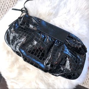 Bryna Nicole black patent leather clutch bag